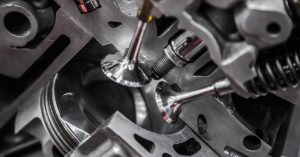 There are metal pieces that have been cut into shape. There are also several springs around the outside of the structure.